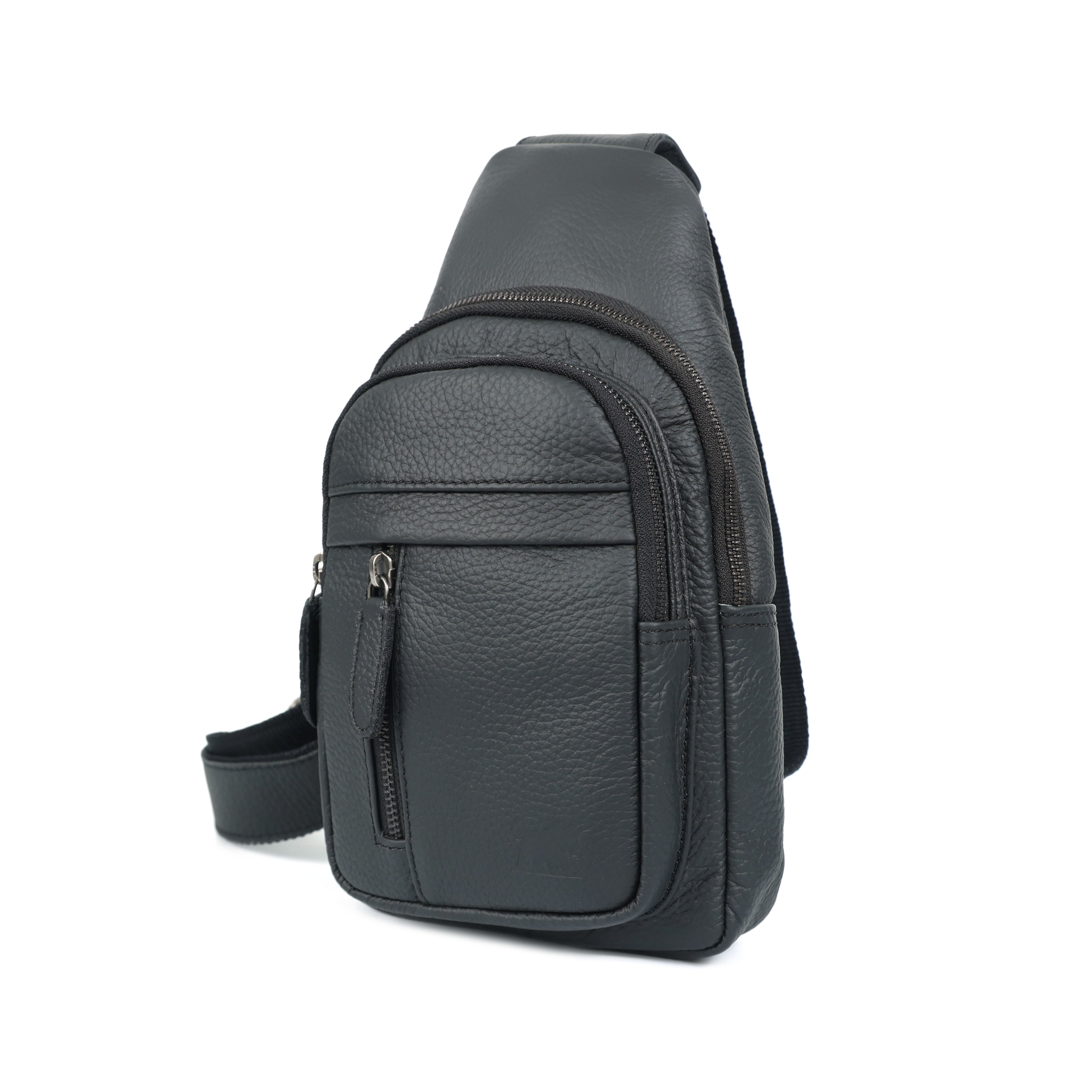 Black leather sling bag on a white background