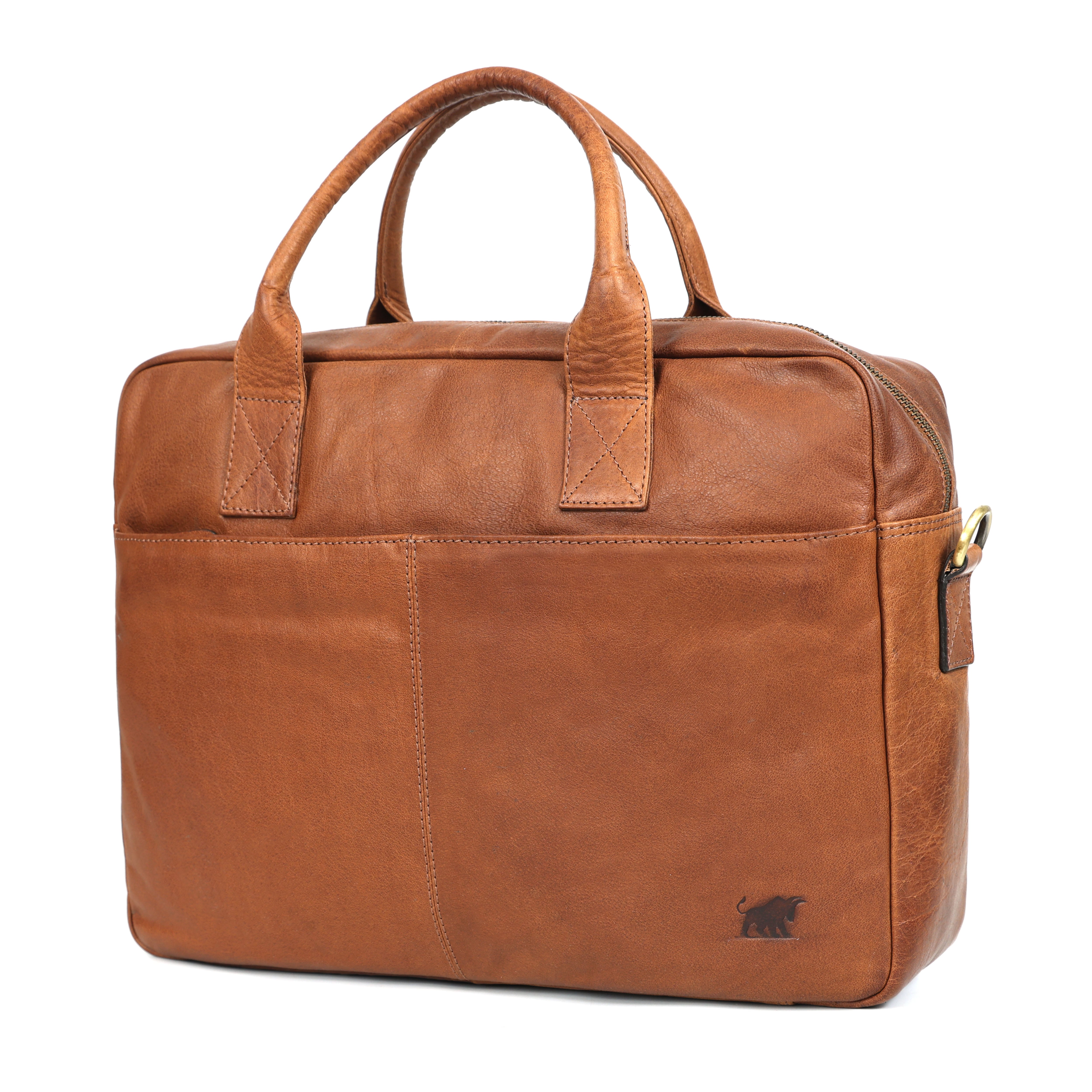 Brown leather bag with gold zipper on a white background