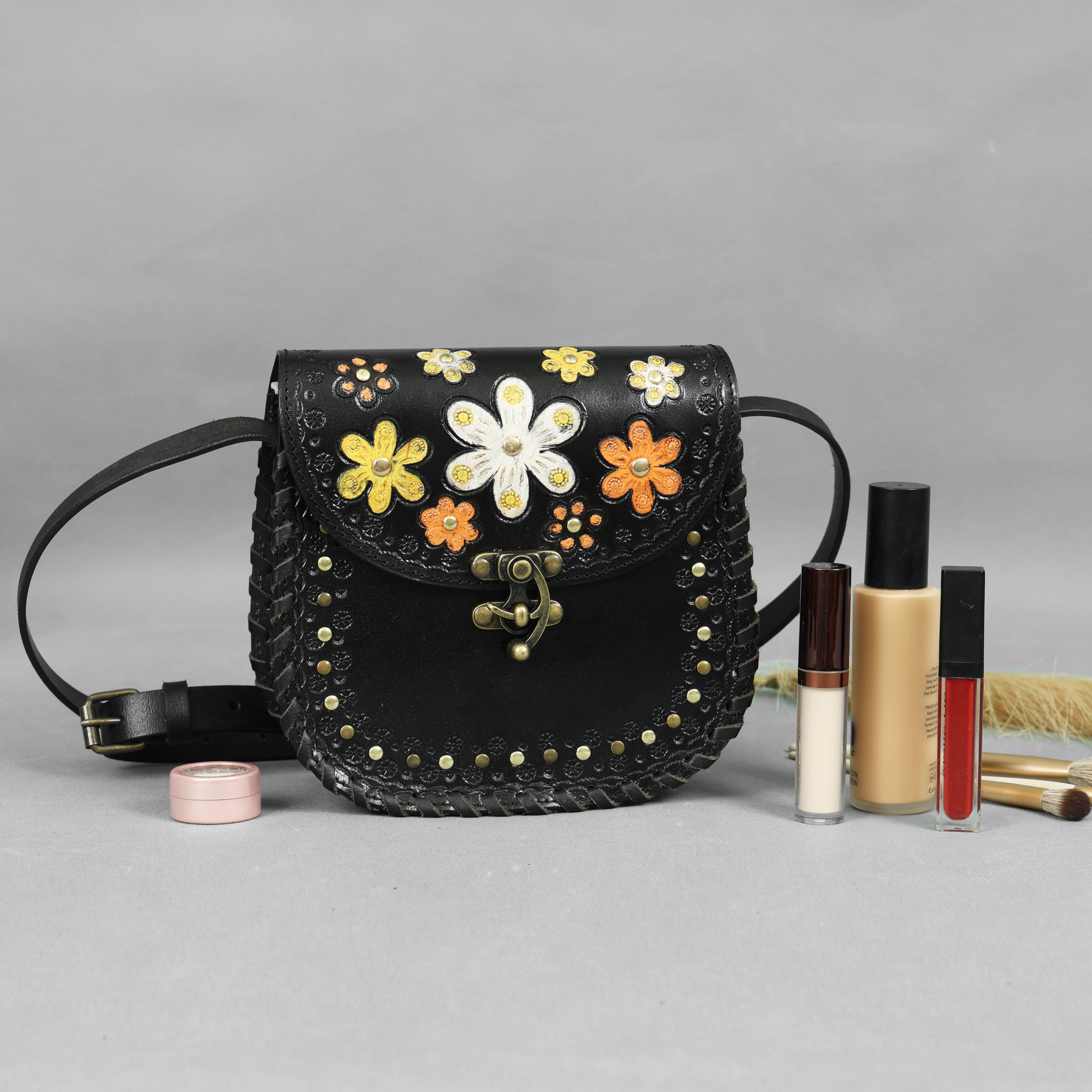 Handcrafted Black Leather Saddle Sling Bag – Floral Embossed Crossbody(EL-GM-42-ON)