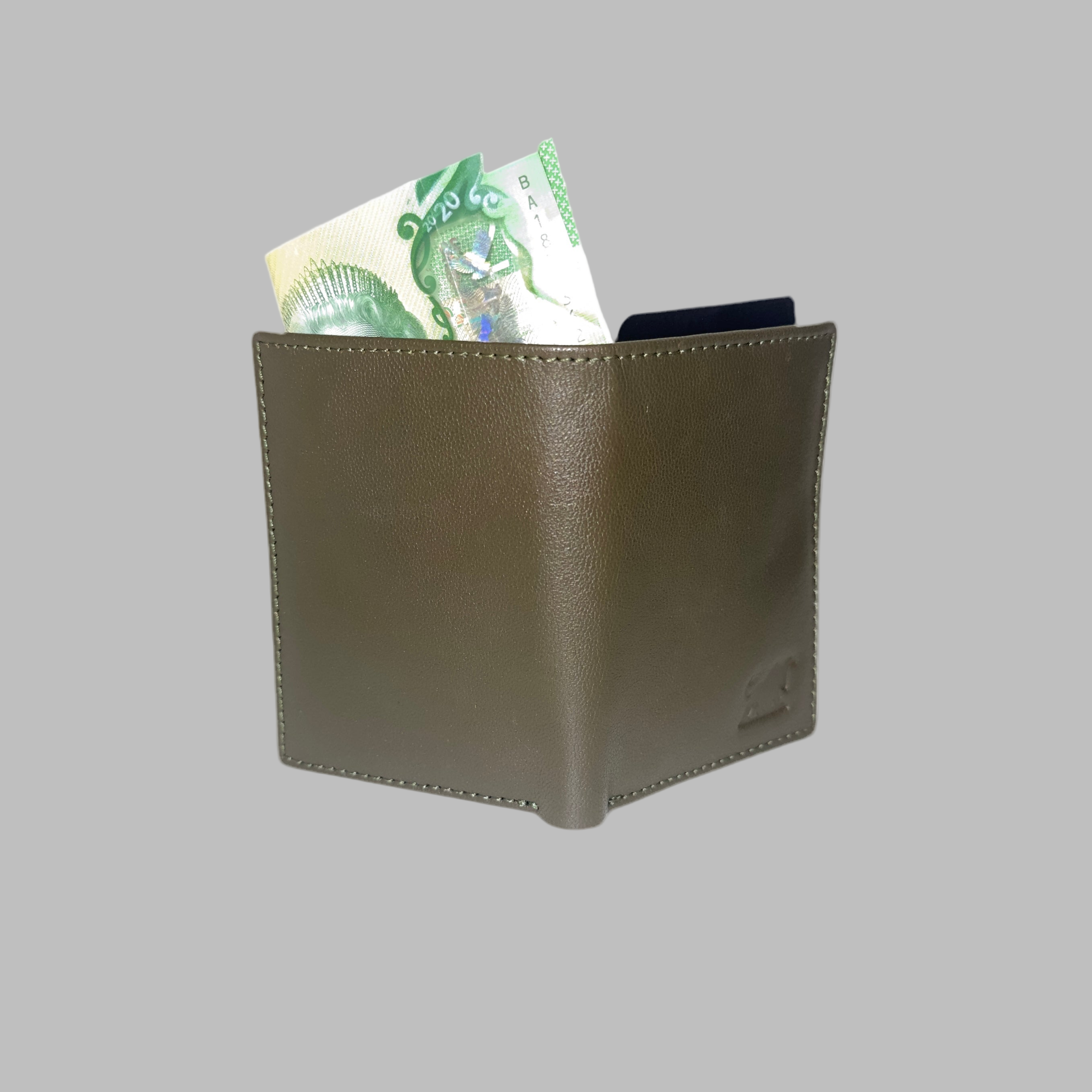 Green leather Card holder with money on a white background