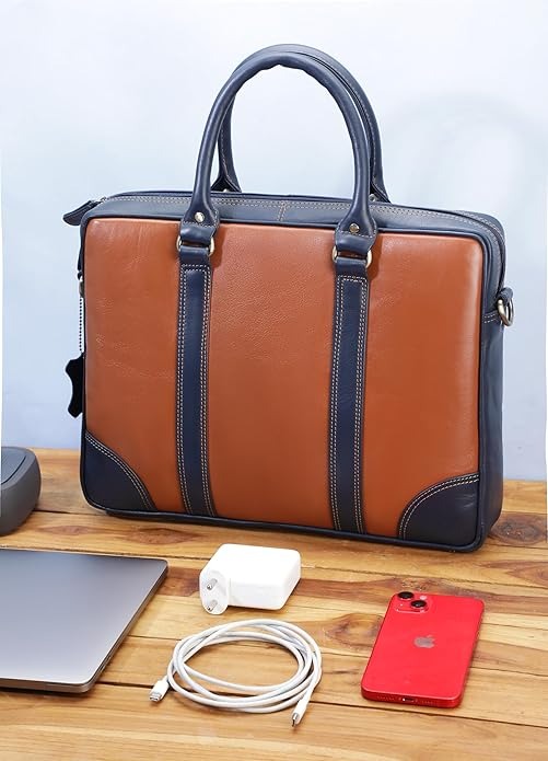 Brown and black leather briefcase on a wooden surface with electronic devices.