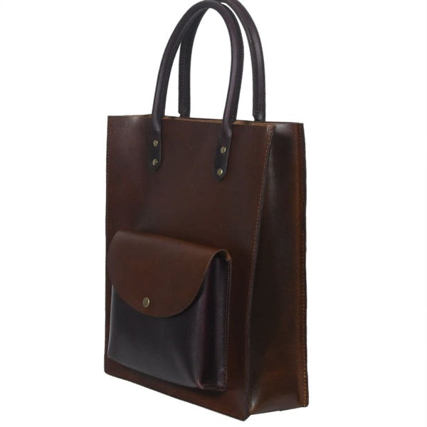 Brown leather tote bag with a pocket on a white background