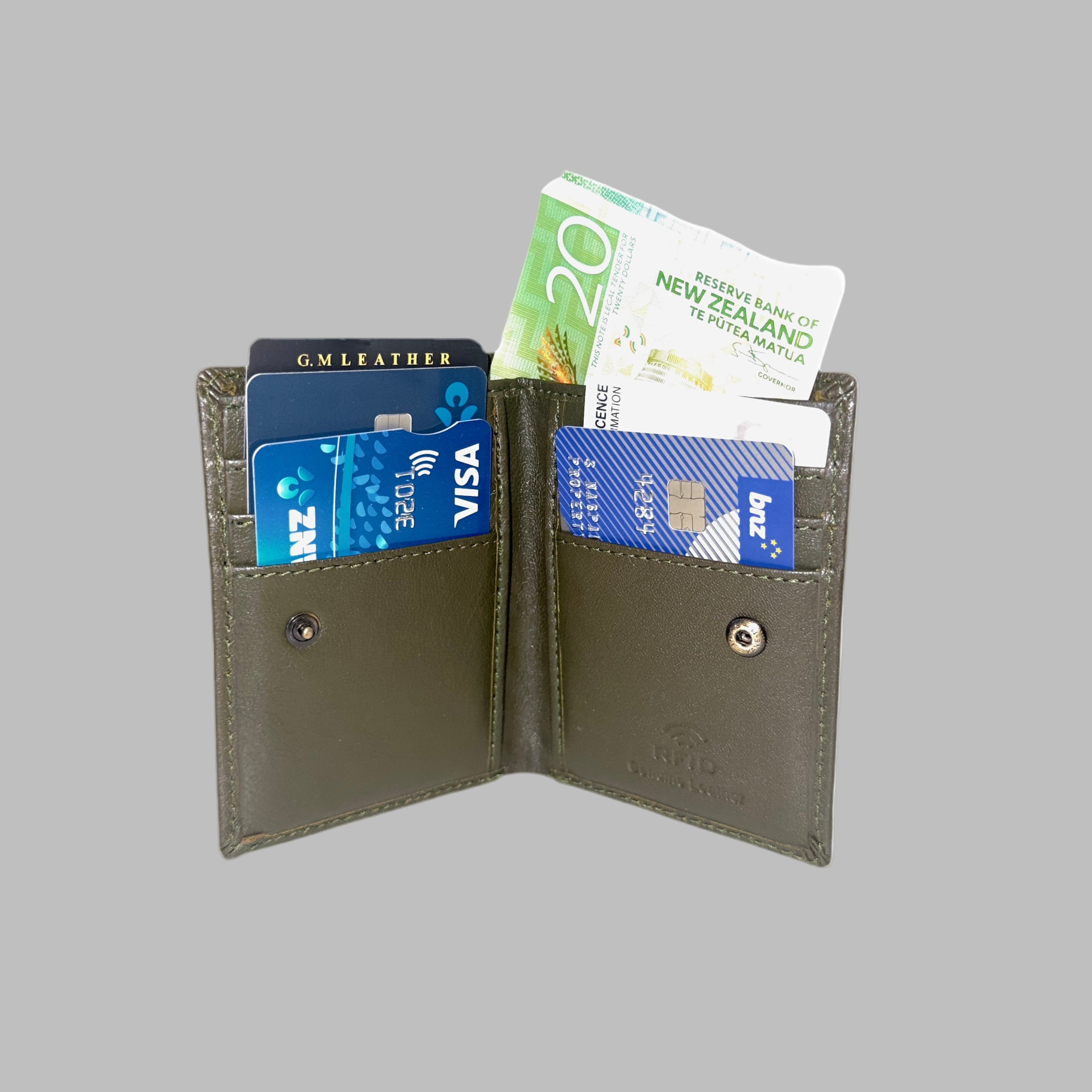 Open wallet with cards and money on a white background