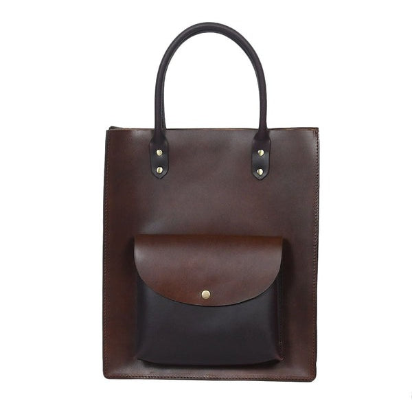 Brown leather tote bag with a smaller brown pouch attached on a white background