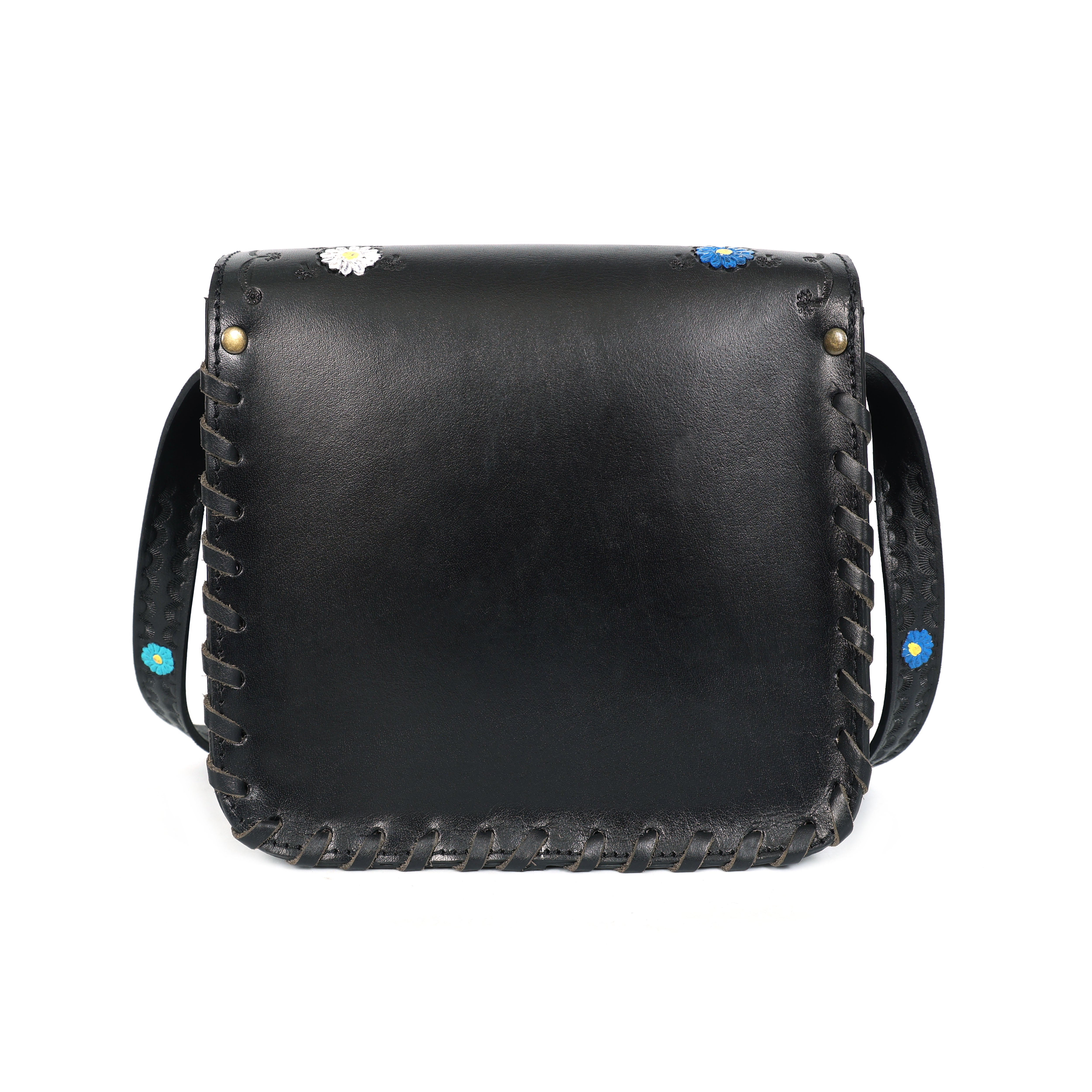 Black leather crossbody bag with decorative elements on a white background