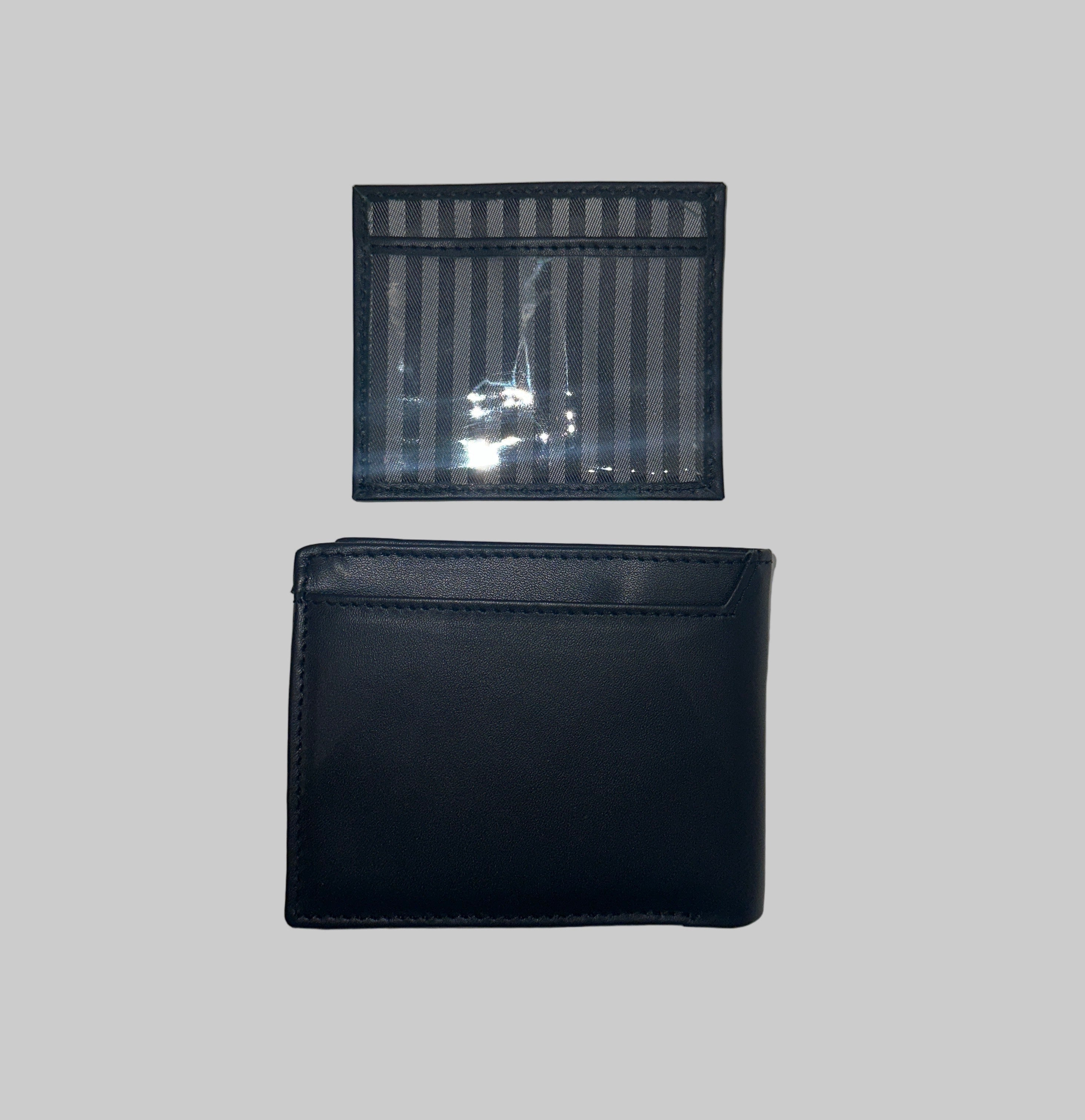 Two wallets, one black and one transparent with striped pattern, on a light gray background.