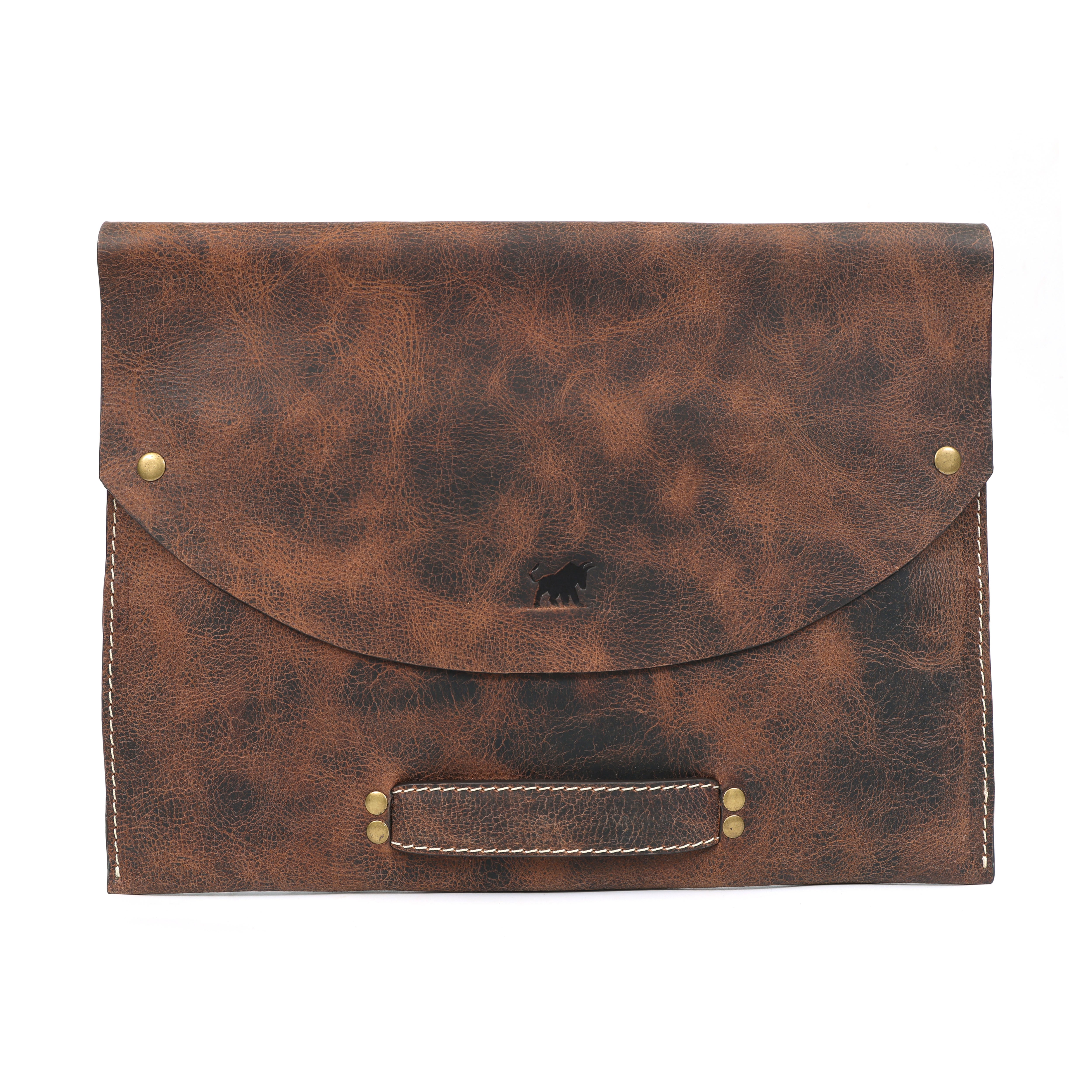 brown distressed full-grain leather laptop or tablet sleeve with a top flap closure, brass rivets, and a single carrying handle