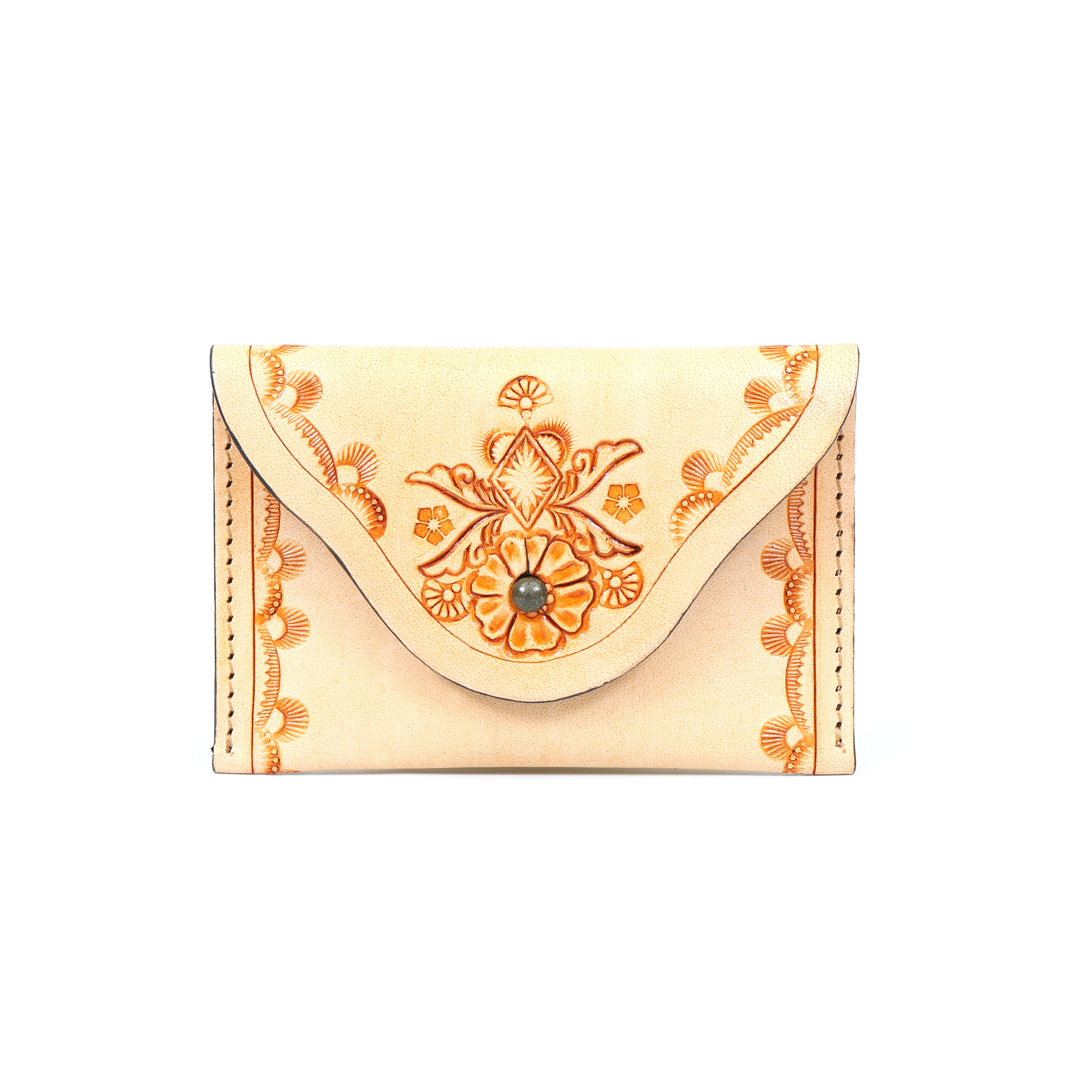 tan hand-tooled full-grain leather card case wallet with floral design, edge stitching, and a central snap closure



