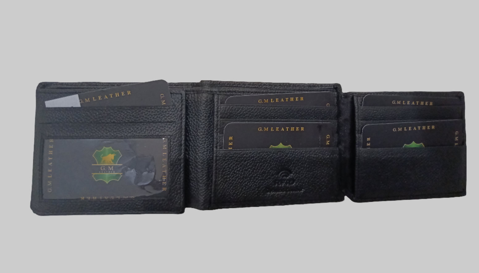 Black leather wallet with card slots and a money clip on a white background