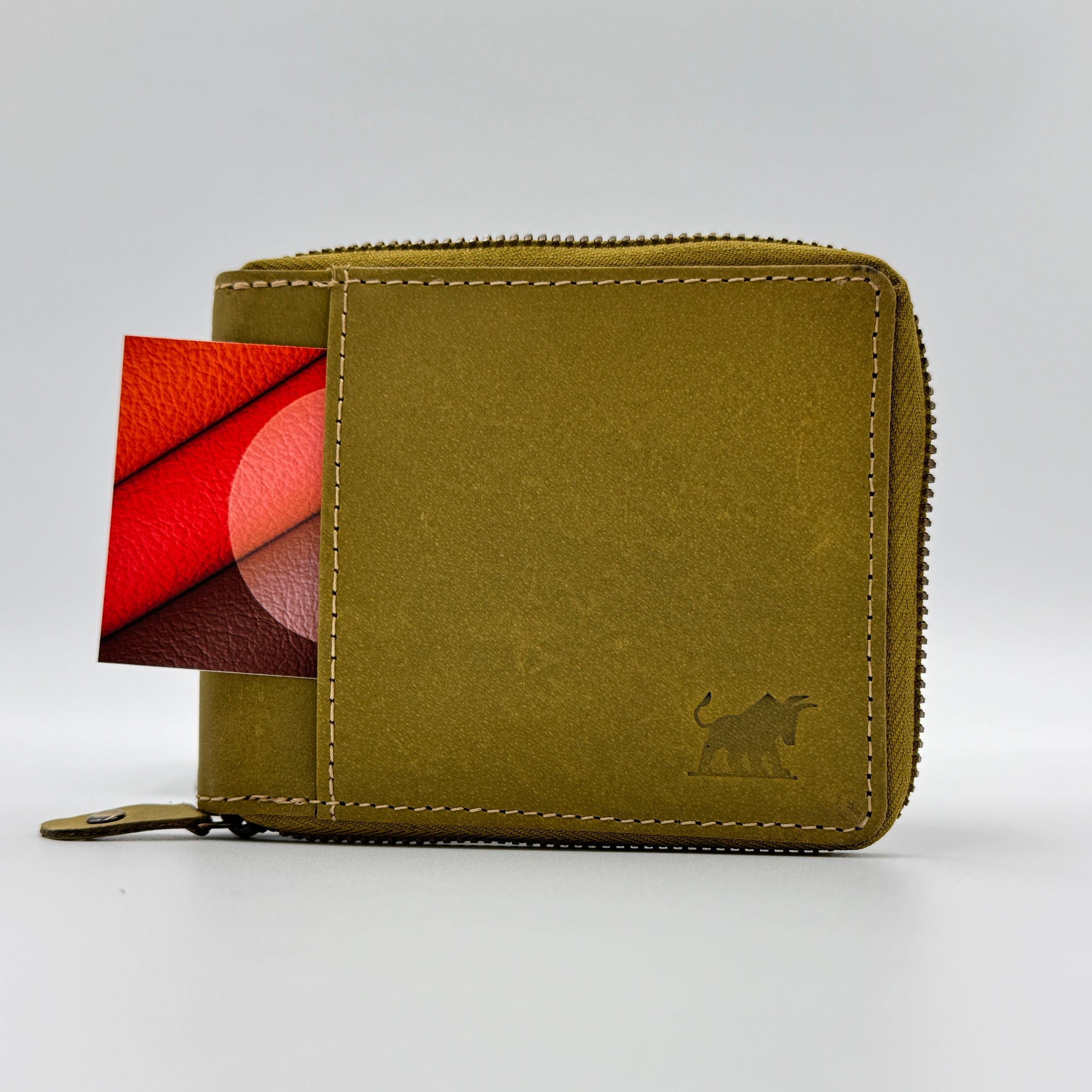 Green cardholder with a small logo on a white background