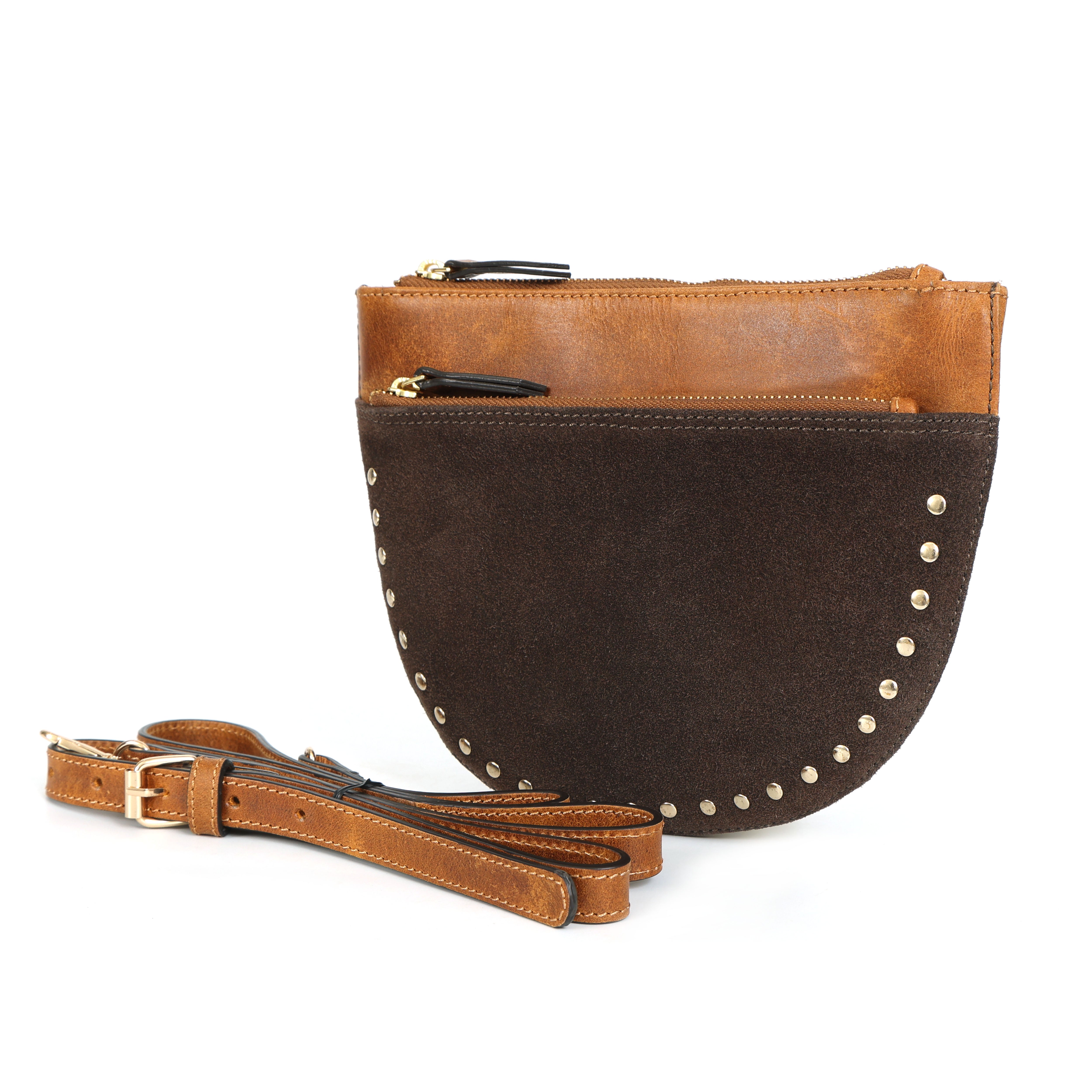 Side angle of an artisan dual-tone leather crossbody belt bag with gold hardware and adjustable strap