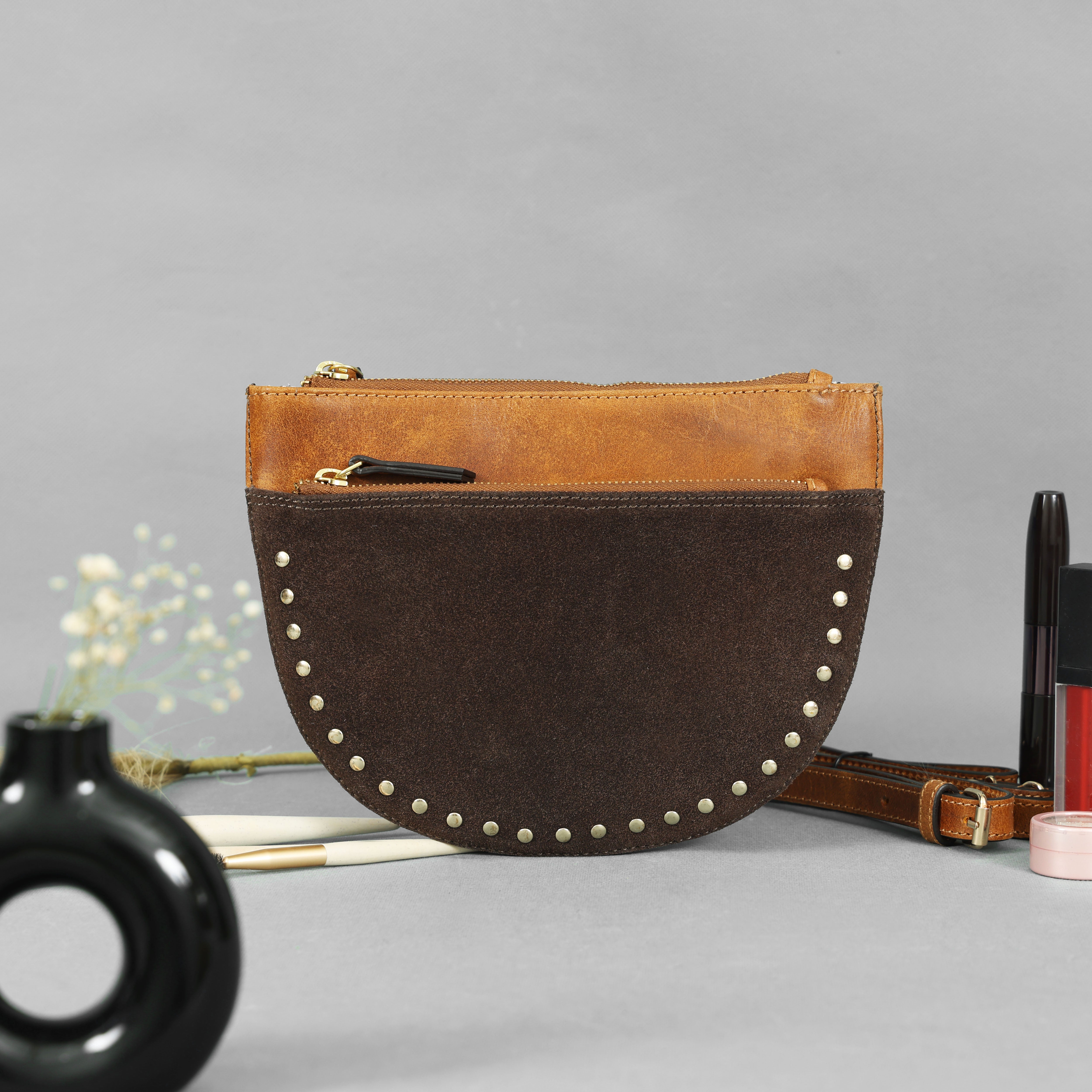“Front view of a luxury dual-tone brown leather crossbody belt bag handcrafted from full-grain leather
