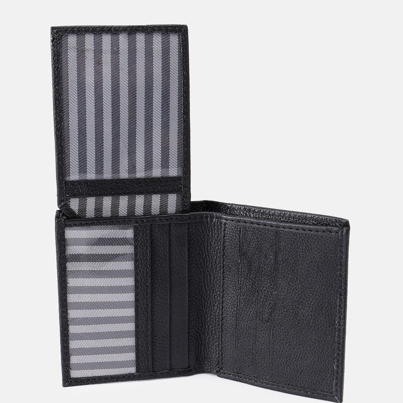 Open interior view of GM Leather black leather bifold wallet showing striped cash pocket lining