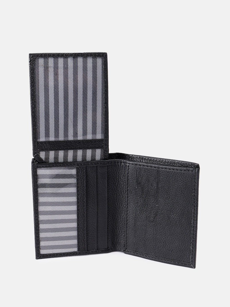 Open interior view of GM Leather black leather bifold wallet showing striped cash pocket lining