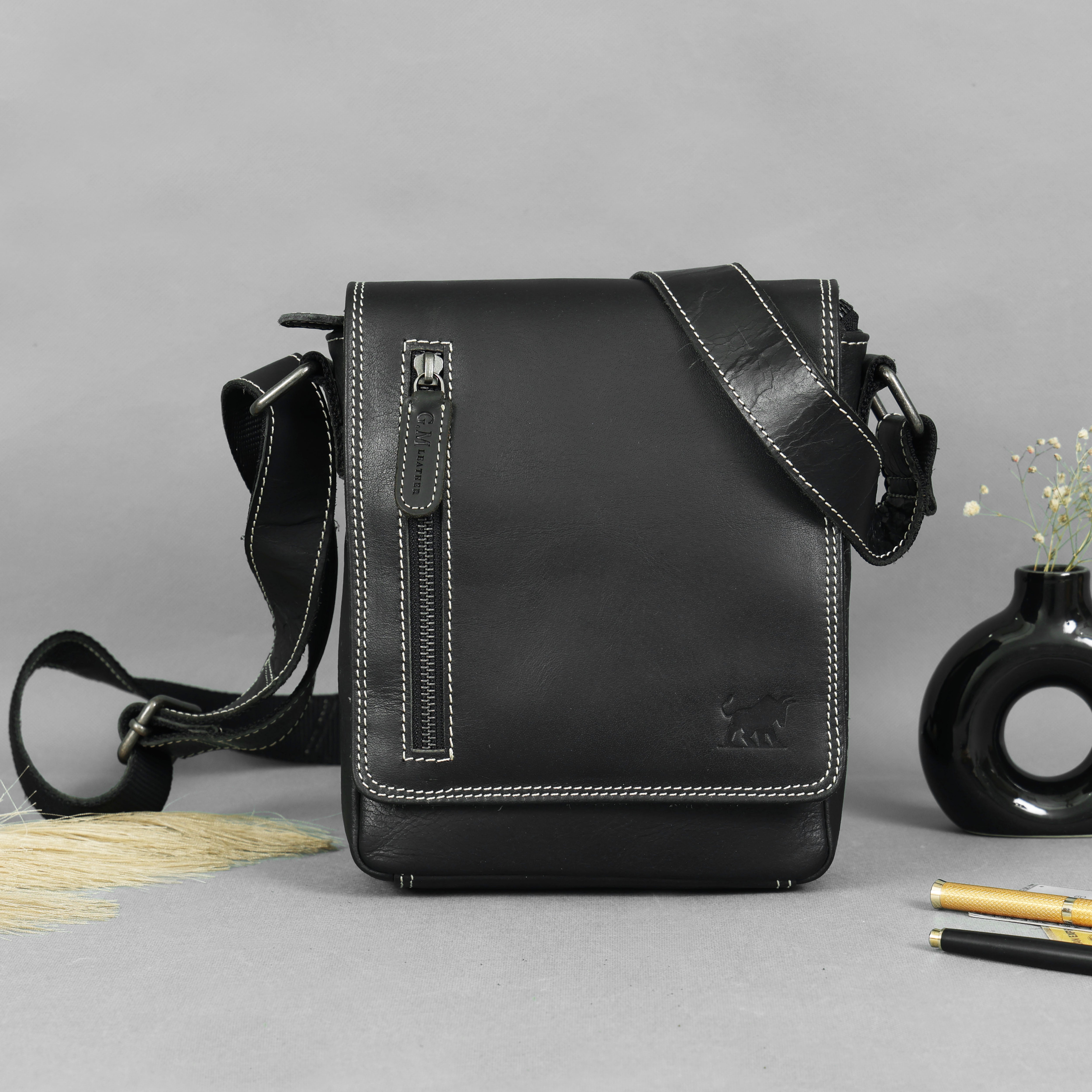 GM Leather small black leather crossbody messenger bag with white contrast stitching and plaid interior lining, premium quality, Auckland.