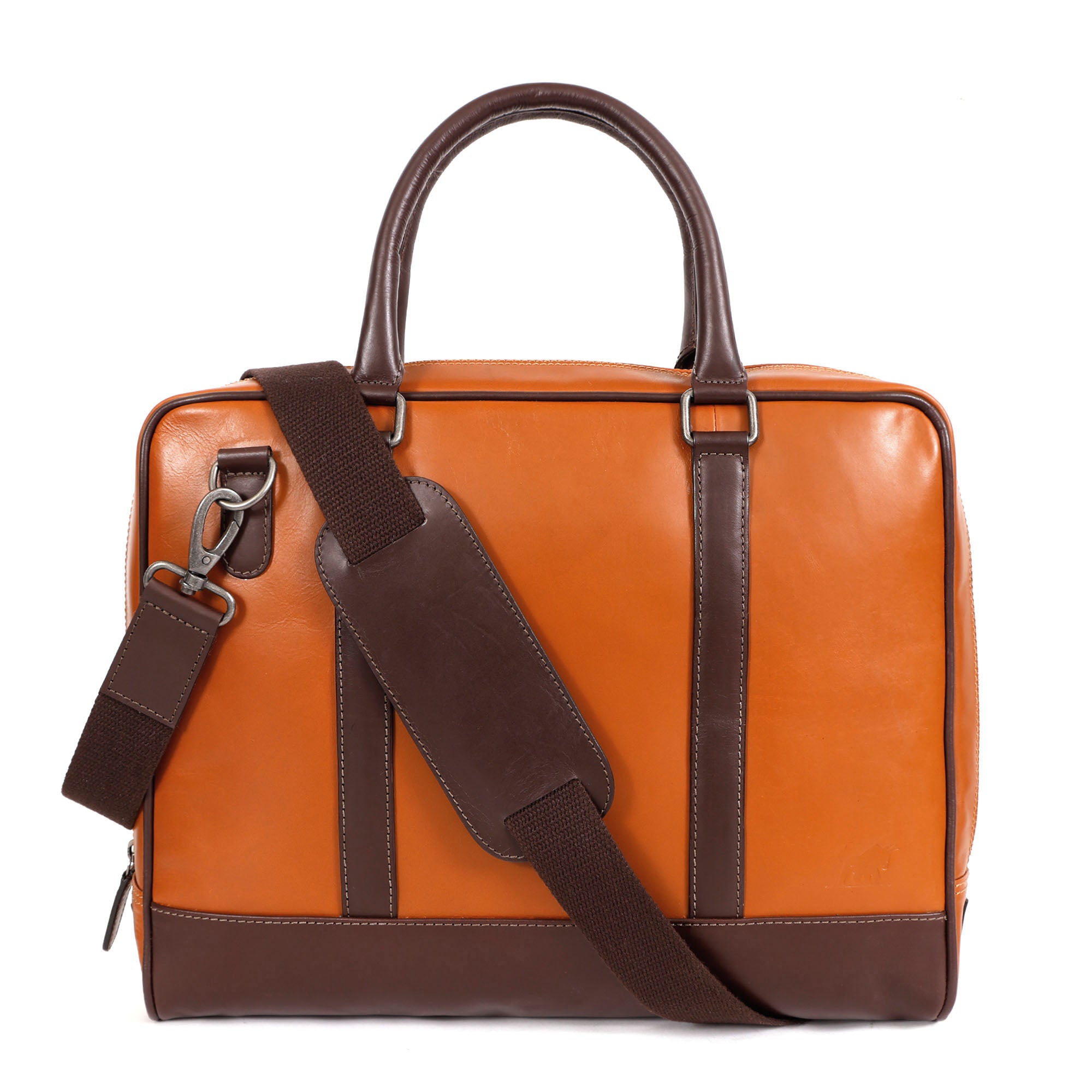 GM Leather briefcase showing a canvas-lined interior and a padded laptop sleeve with a dark brown leather securing tab.