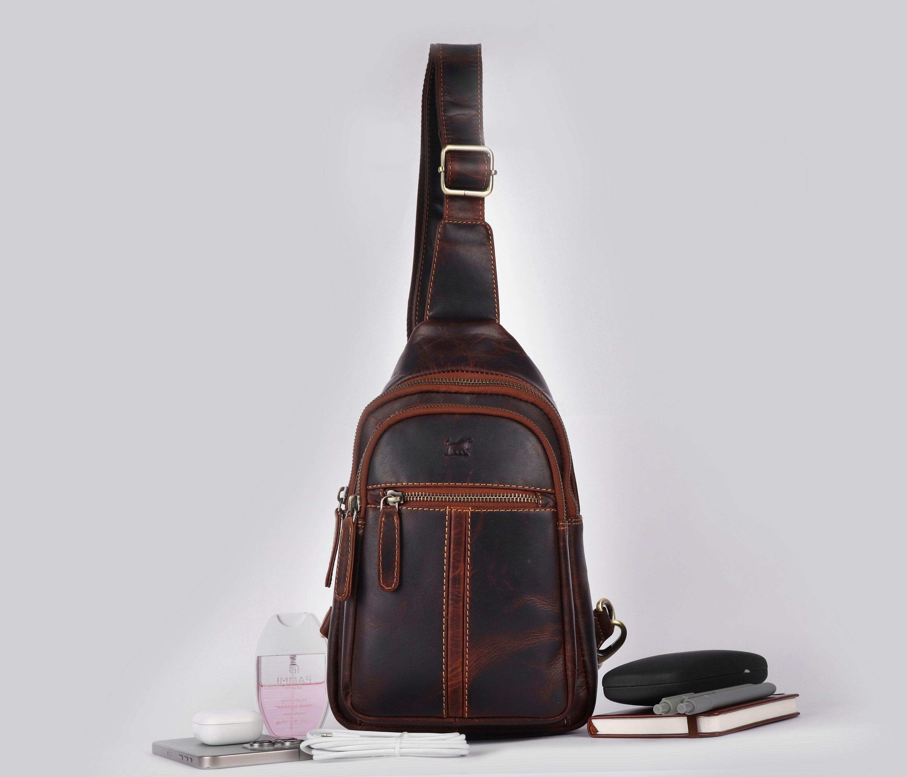 Cherry brown leather crossbody chest bag with front zip pockets by GM Leather Auckland, handcrafted full-grain travel and everyday bag