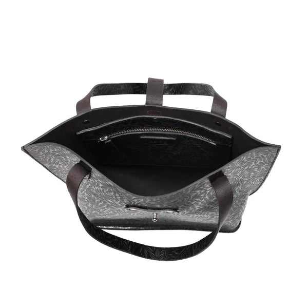 GM Leather artisan brown hand-tooled floral round bag featuring deep floral carving, available at LynnMall New Lynn.