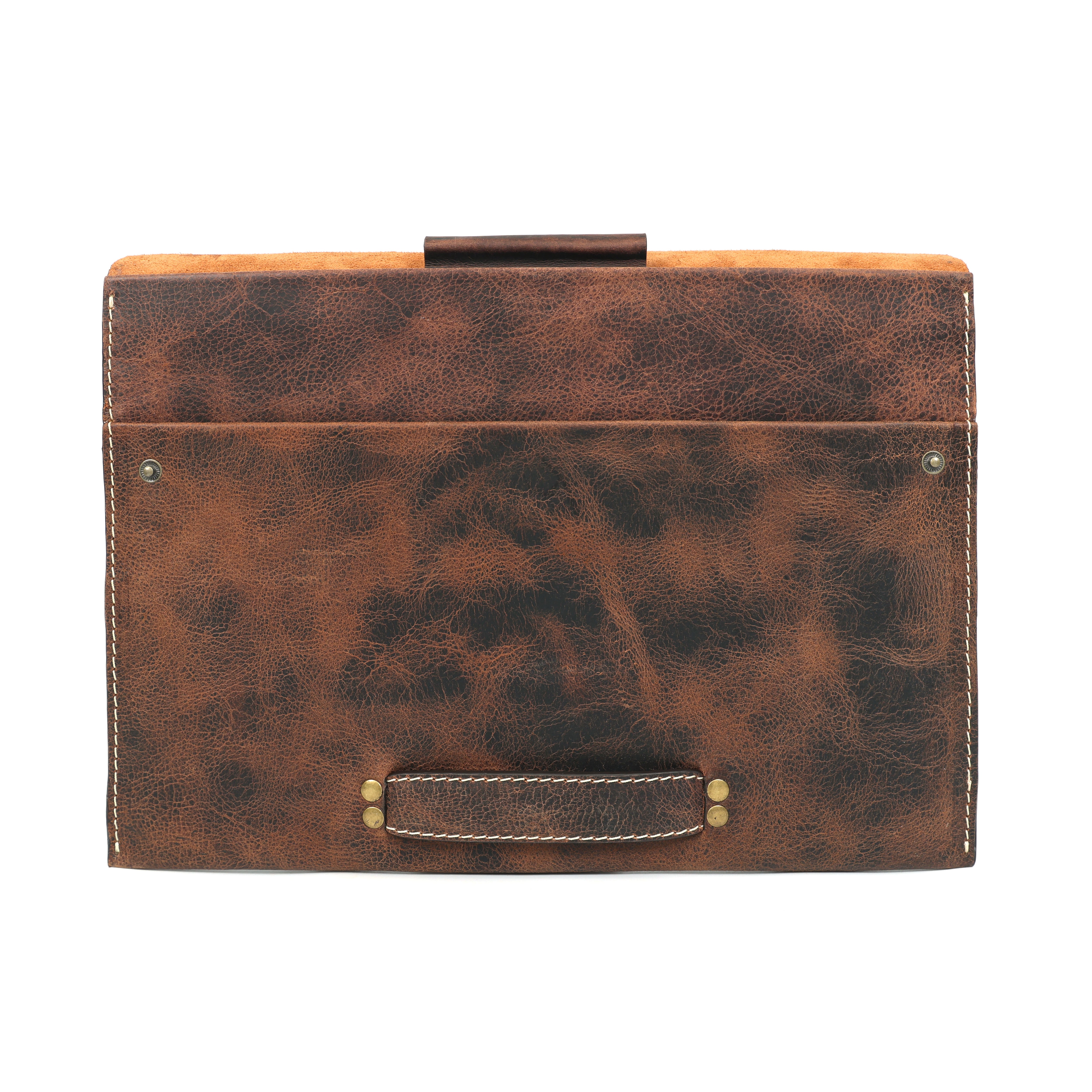 GM Leather Auckland Distressed Brown Leather Laptop Sleeve Portfolio with a carry handle and brass stud closure, suitable for 15-inch MacBooks.