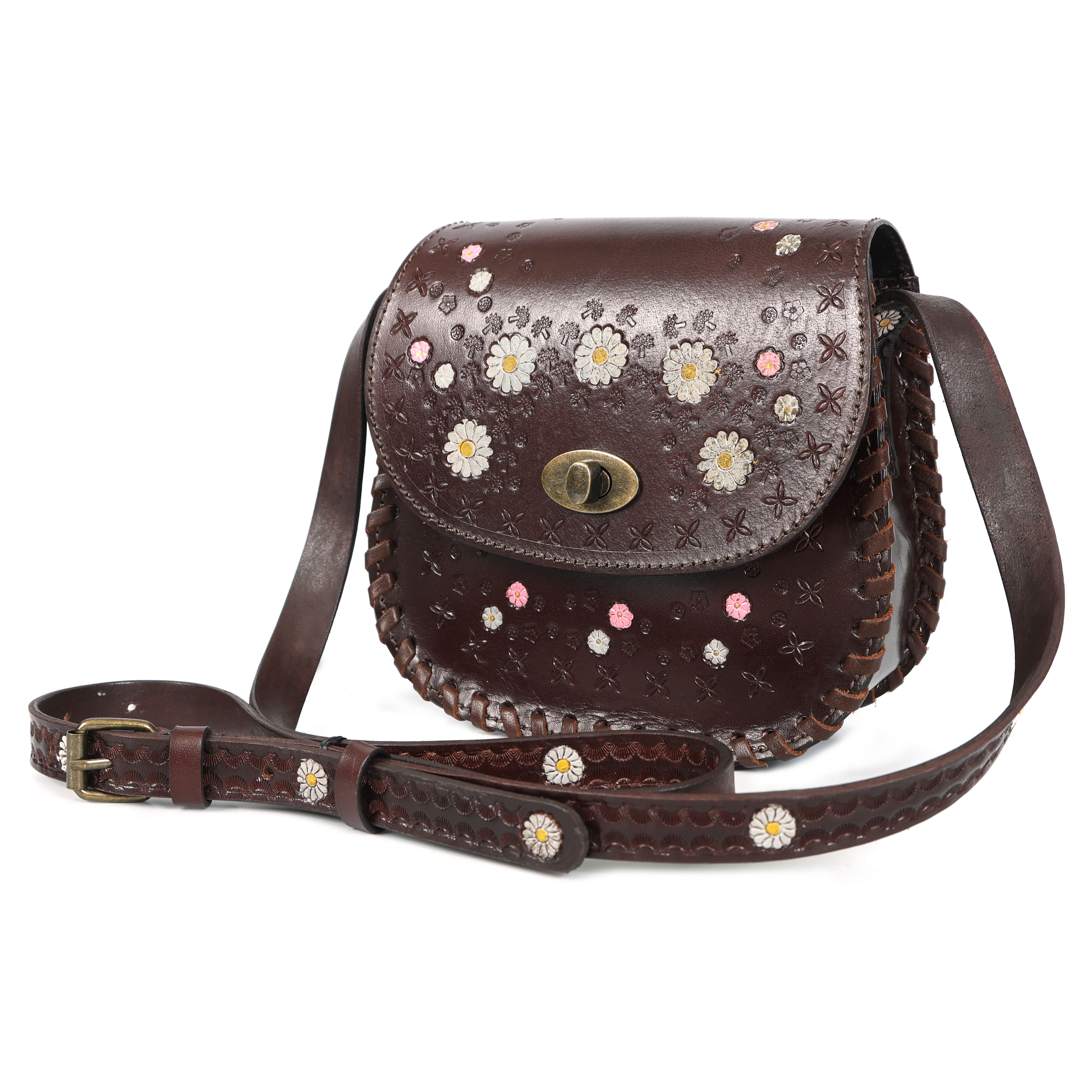 A premium GM Leather dark brown saddle bag featuring hand-painted white and pink floral embossing with a brass twist-lock, handcrafted and available at LynnMall, Auckland.