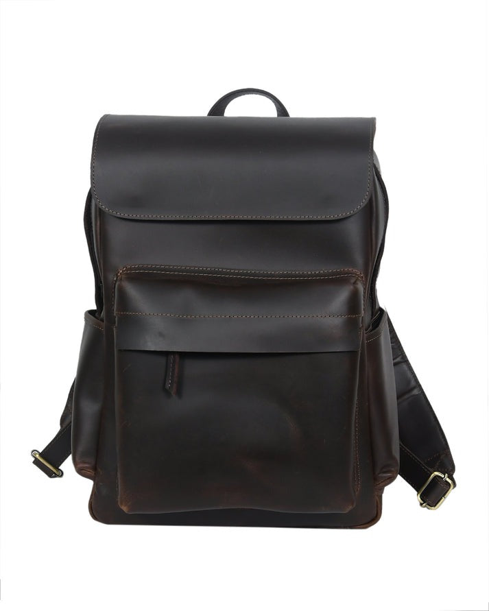 A premium GM Leather handcrafted dark brown leather backpack with a large front pocket and padded laptop interior, available at the LynnMall shop in Auckland.