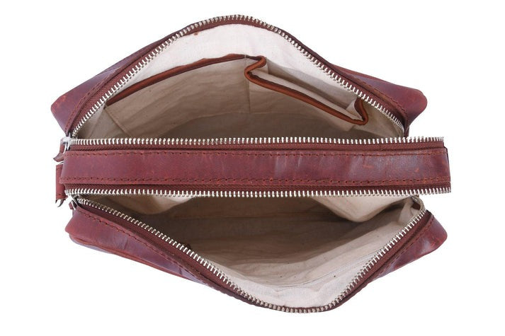 GM Leather leather satchel showing dual compartments and cream canvas lining, GM Leather Auckland.