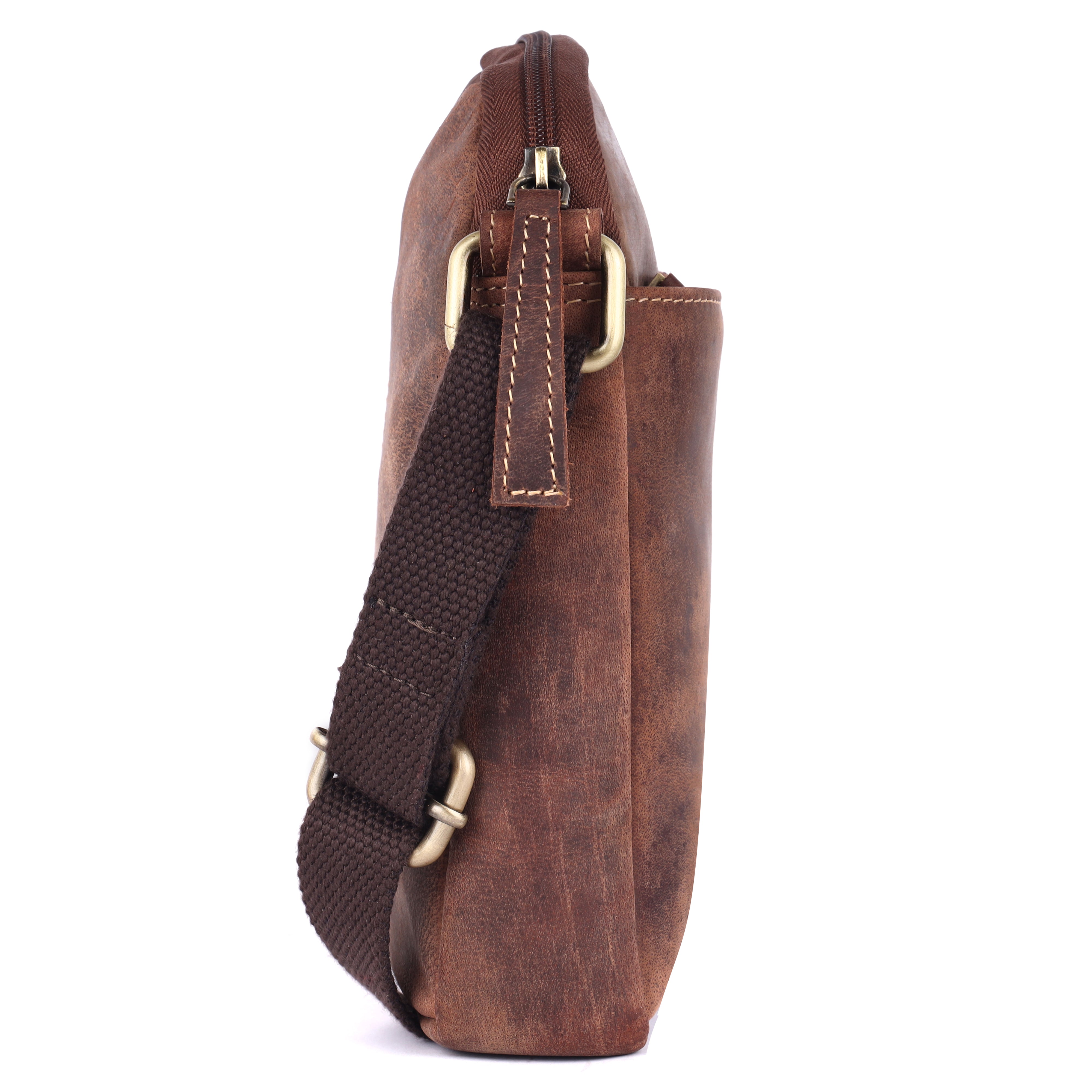 Side profile view of the compact GM Leather brown shoulder bag showing its slim silhouette, heavy-duty side metal rings, and dark canvas adjustable strap.