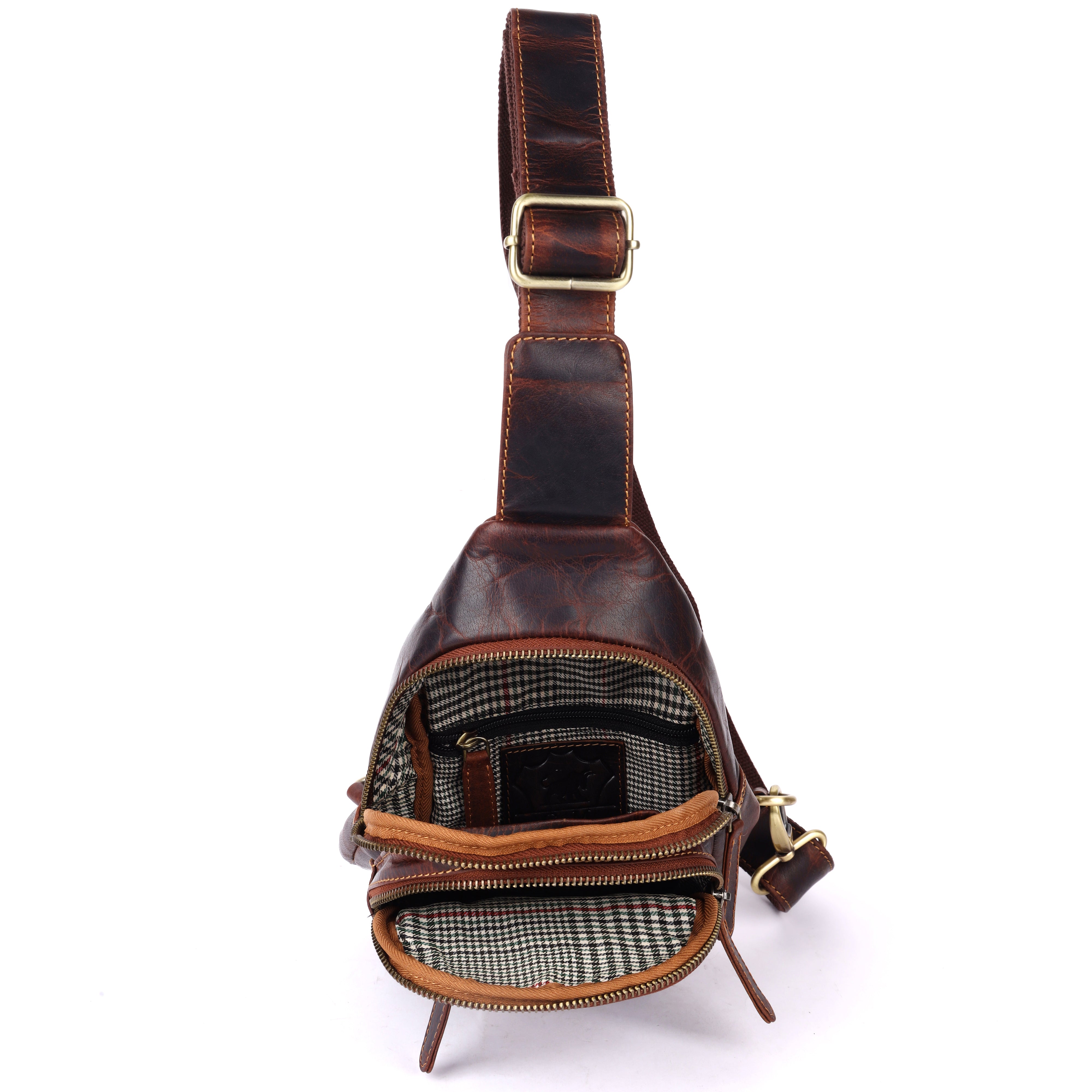 Open interior view of GM Leather Sling Bag showing the houndstooth lining and deep zipper pockets.