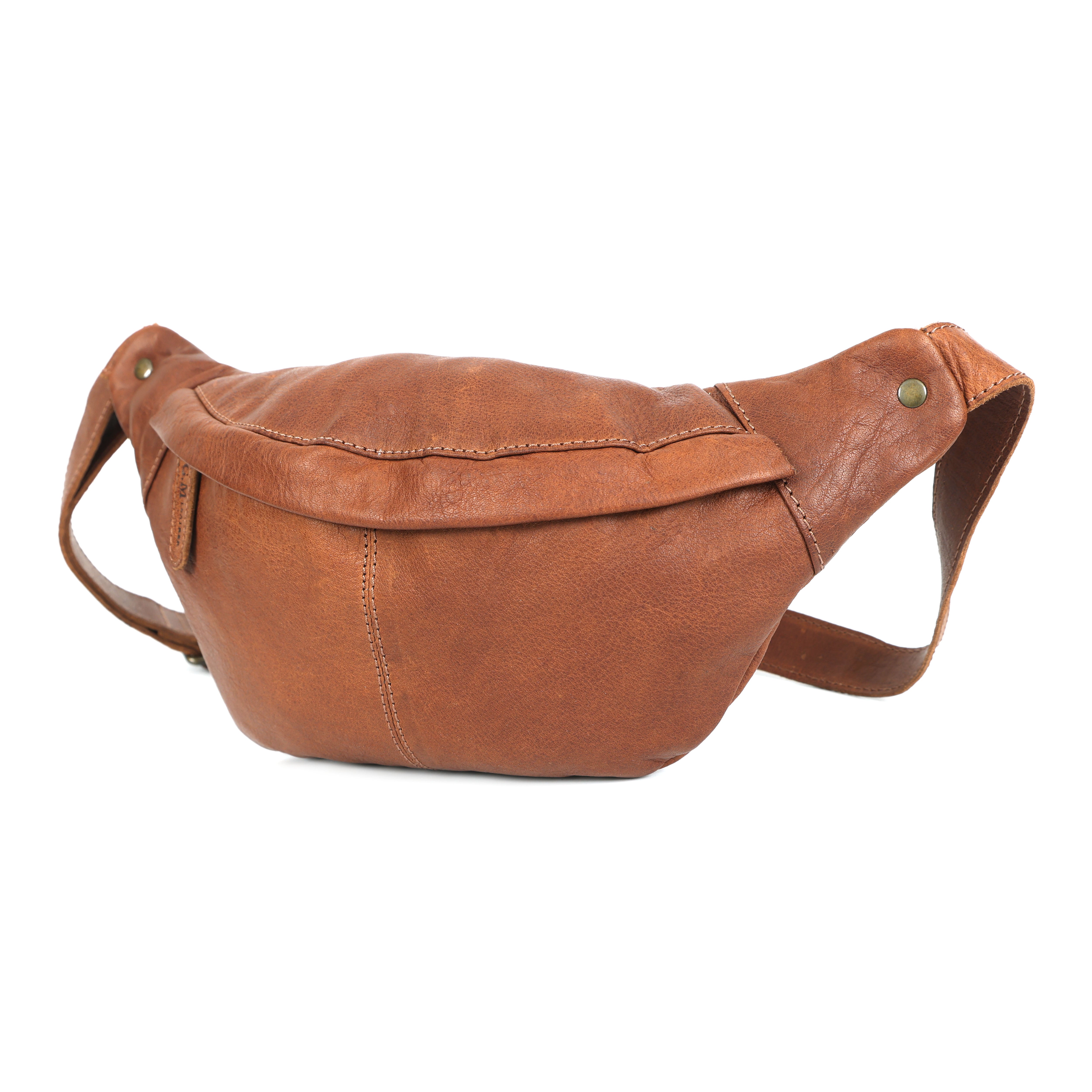 GM Leather Auckland tan leather waist bag showing the spacious compartment and secure zippered pocket.