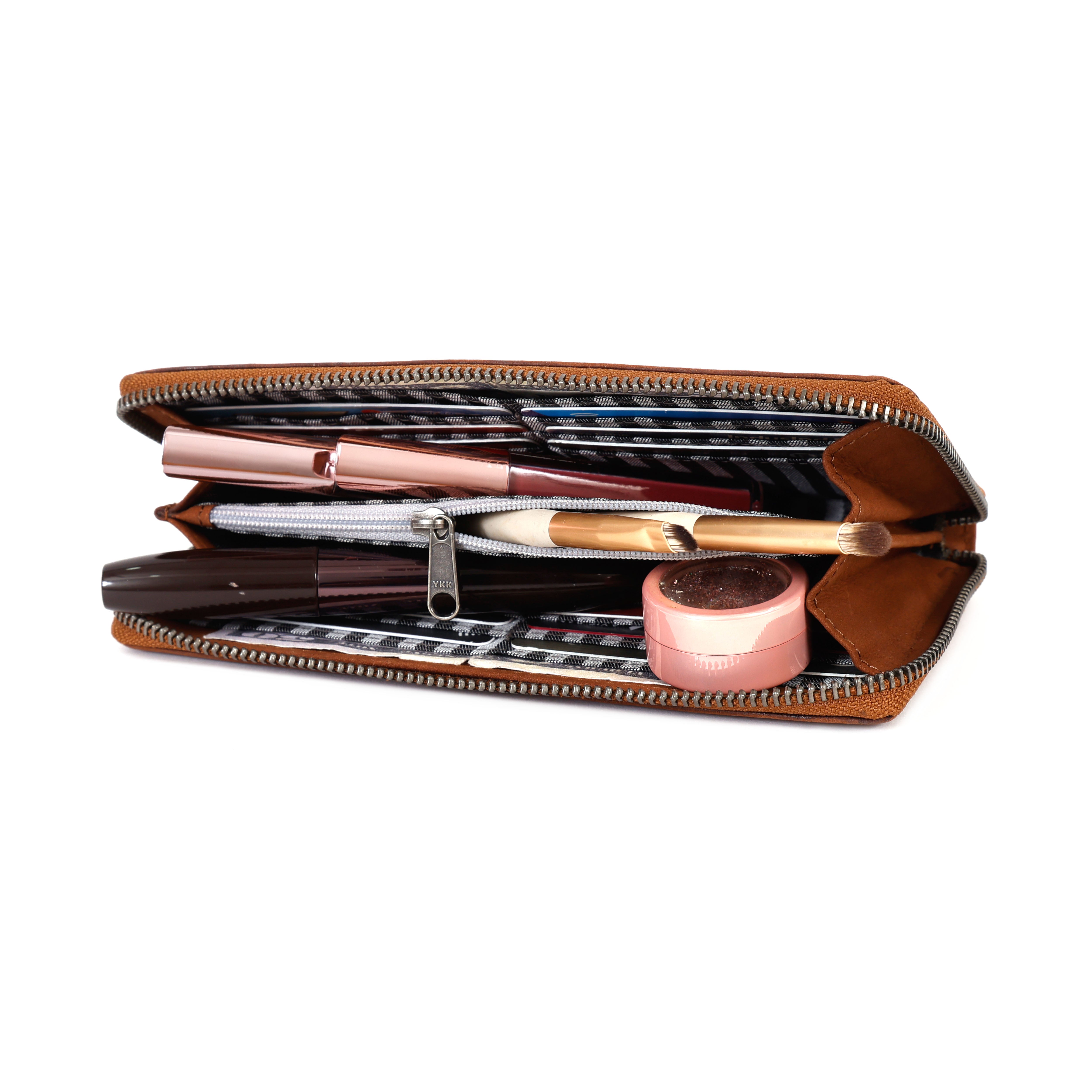 Leather womens leather wallet showing card holder sections and daily essential pocket with cosmetic