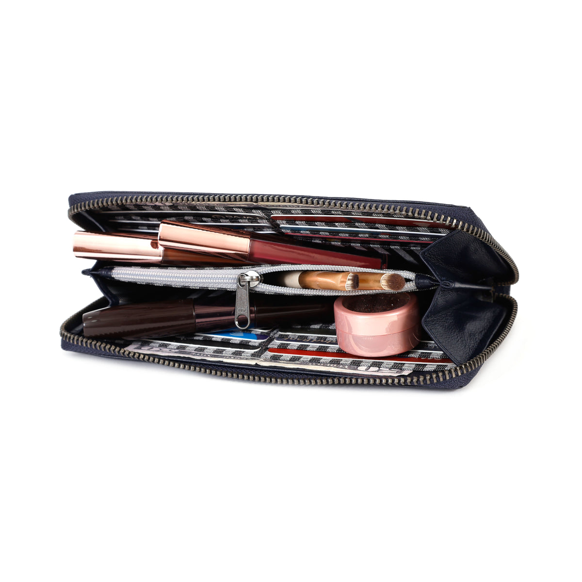 GM Leather womens clutch showing card holder slots and daily essential pocket filled with makeup.