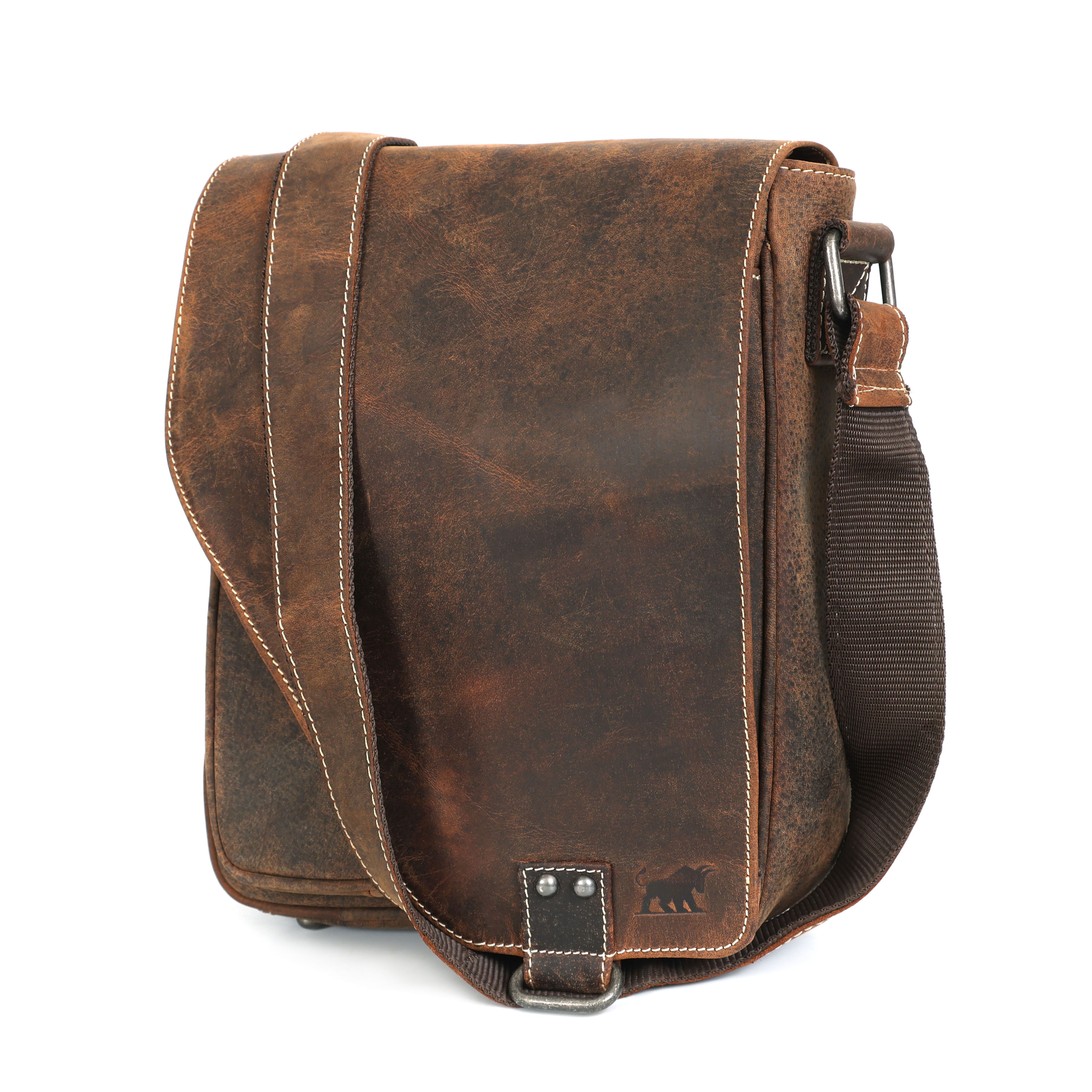 brown distressed hunter leather messenger bag with a flap closure, white contrast stitching, a bull logo on the front, and a shoulder strap.
